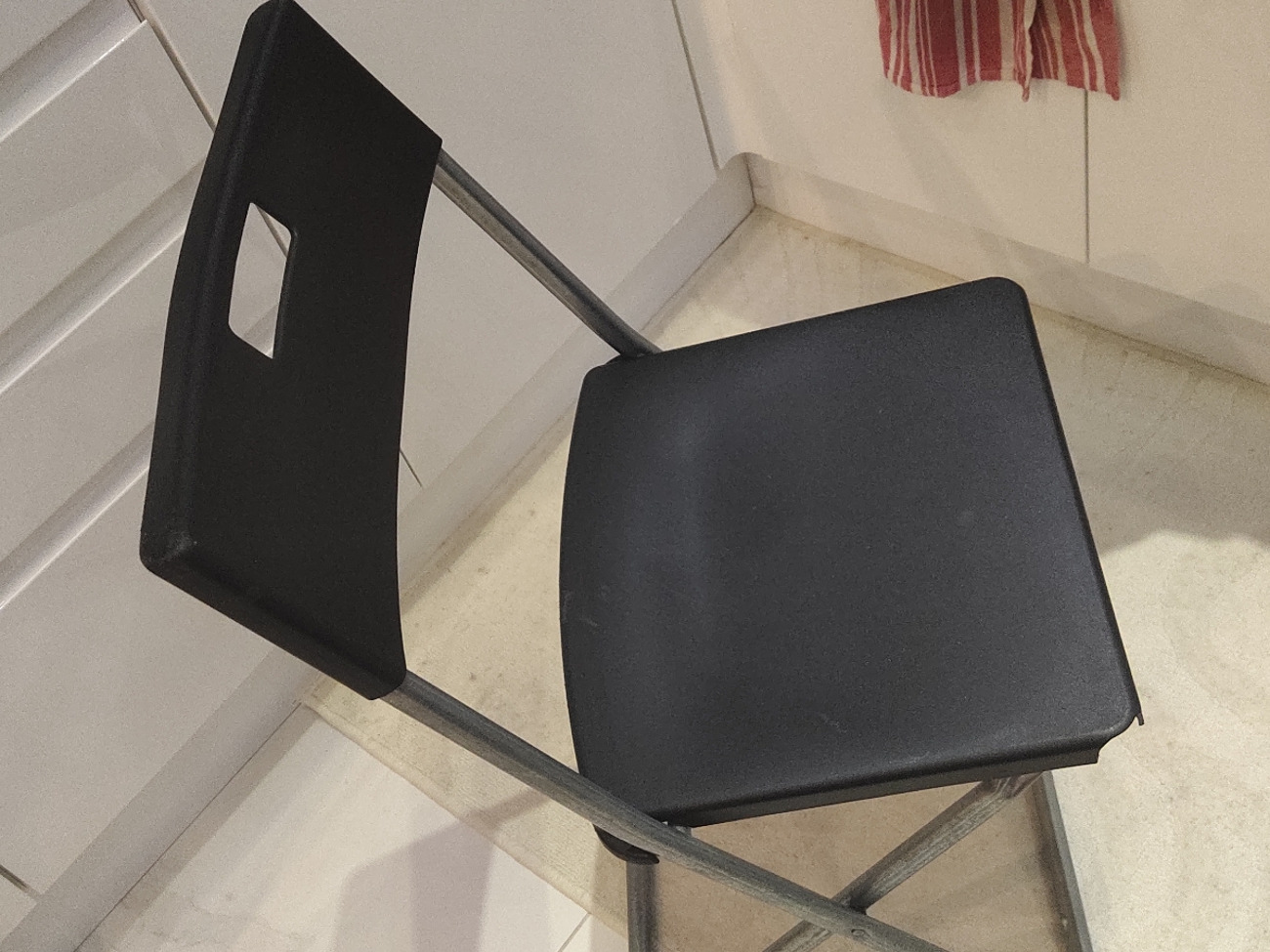 9 black folding chairs
