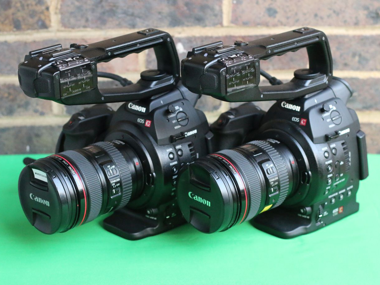 2x canon c100 kit with lens and tripod