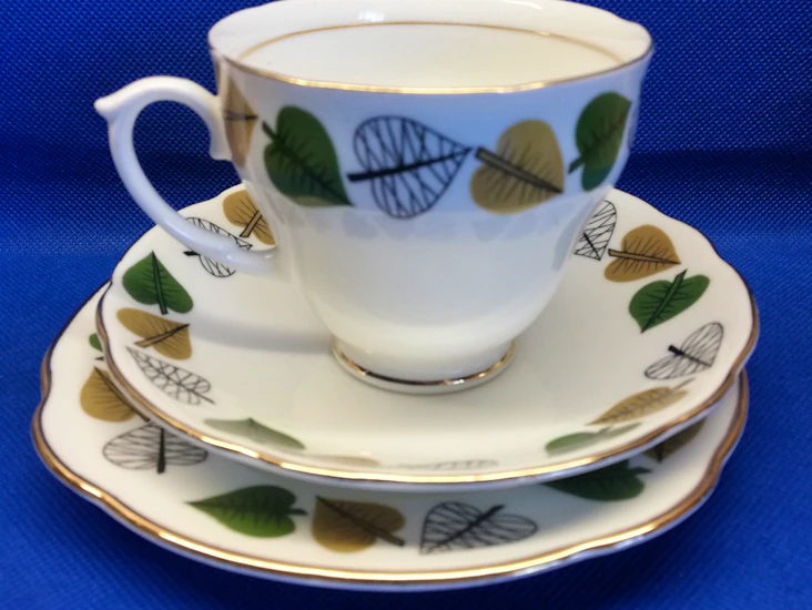 6 coffee cups, saucers and side plates