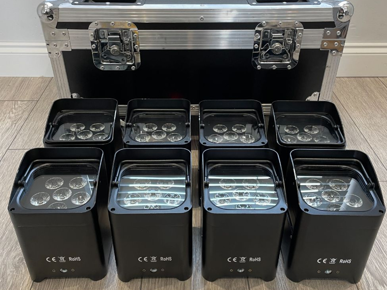 8x wireless uplighters in charger case for hire