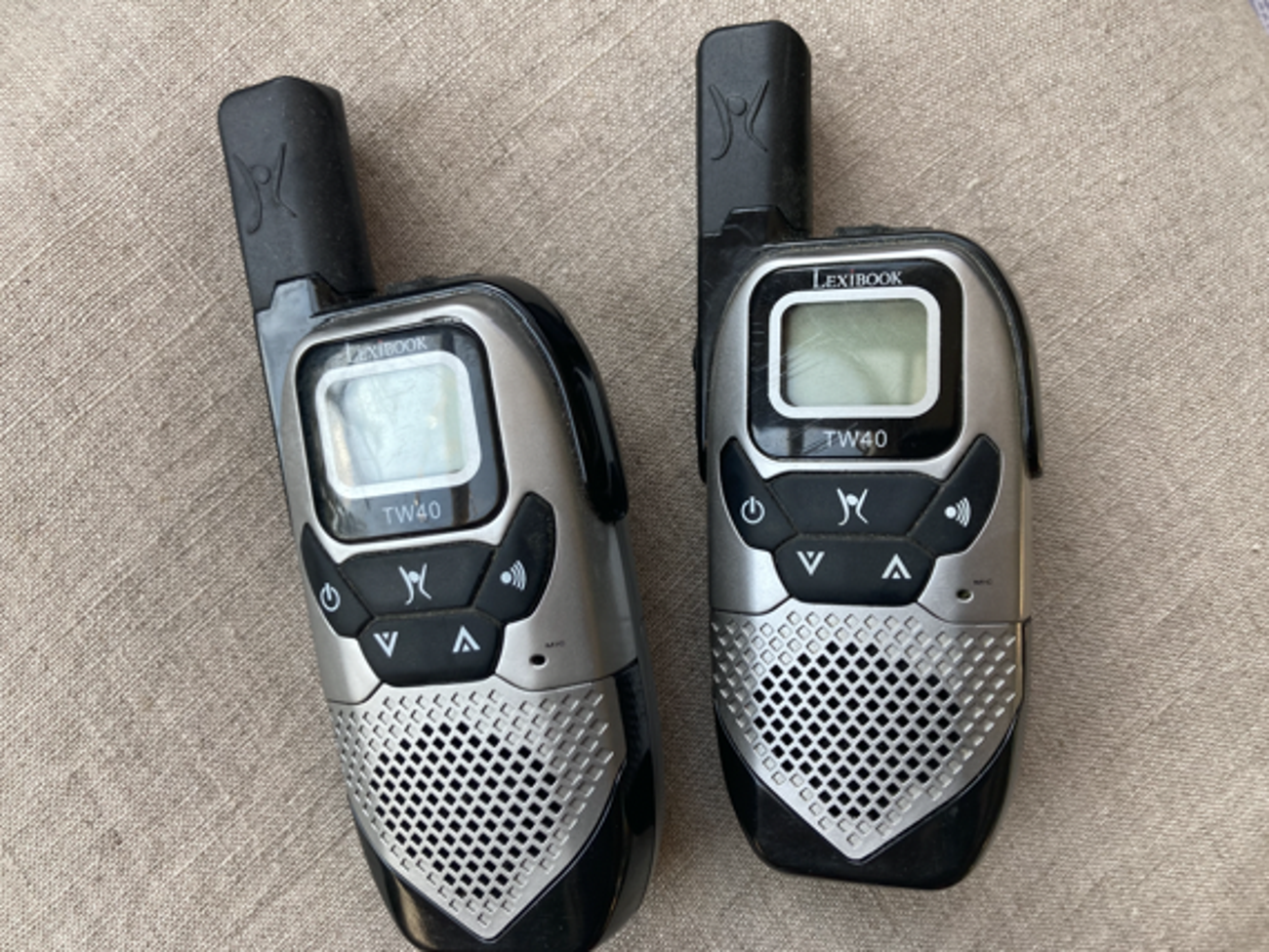 A pair of walkie talkies - props