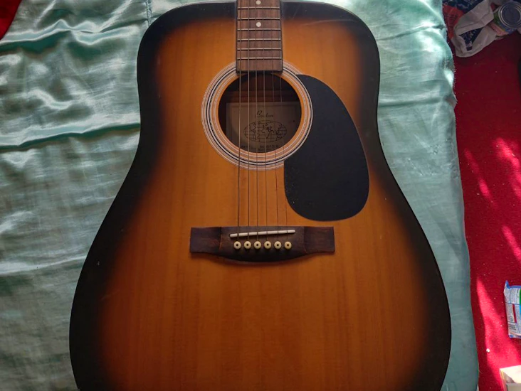 Acoustic guitar; boston bn200tosb