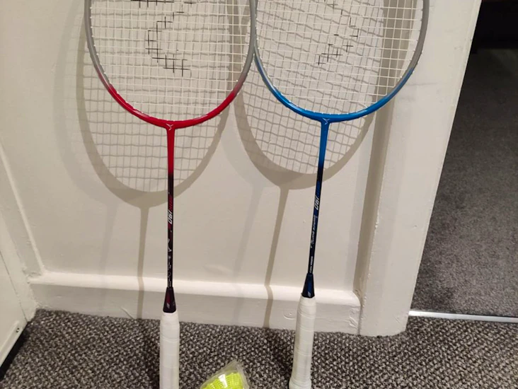 Badminton rackets with slipcover