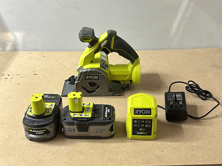 Battery powered multi material saw
