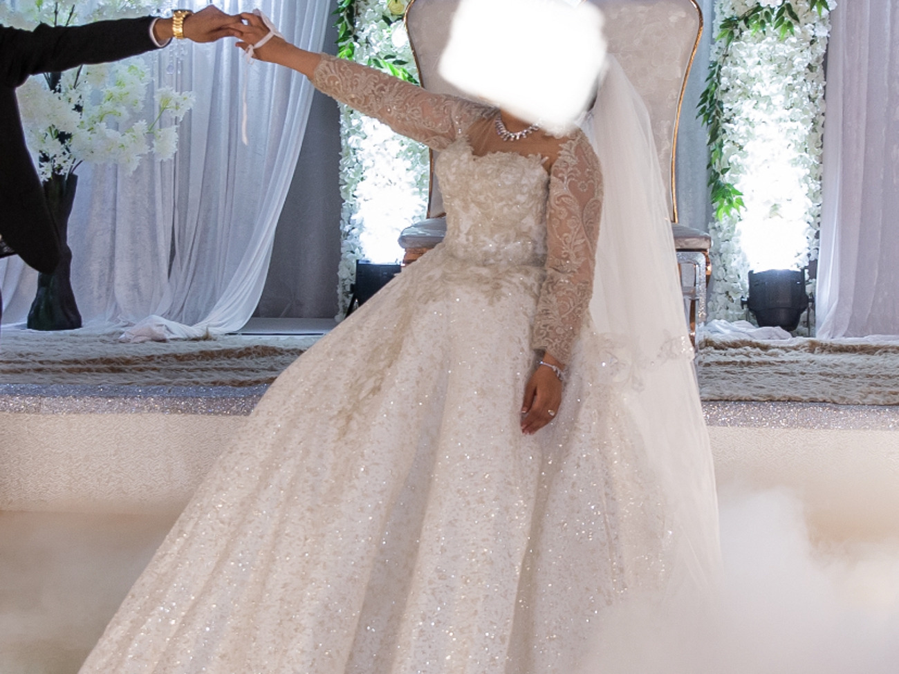 Beaded ivory wedding dress and veil