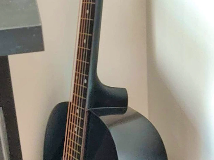 Black acoustic guitar