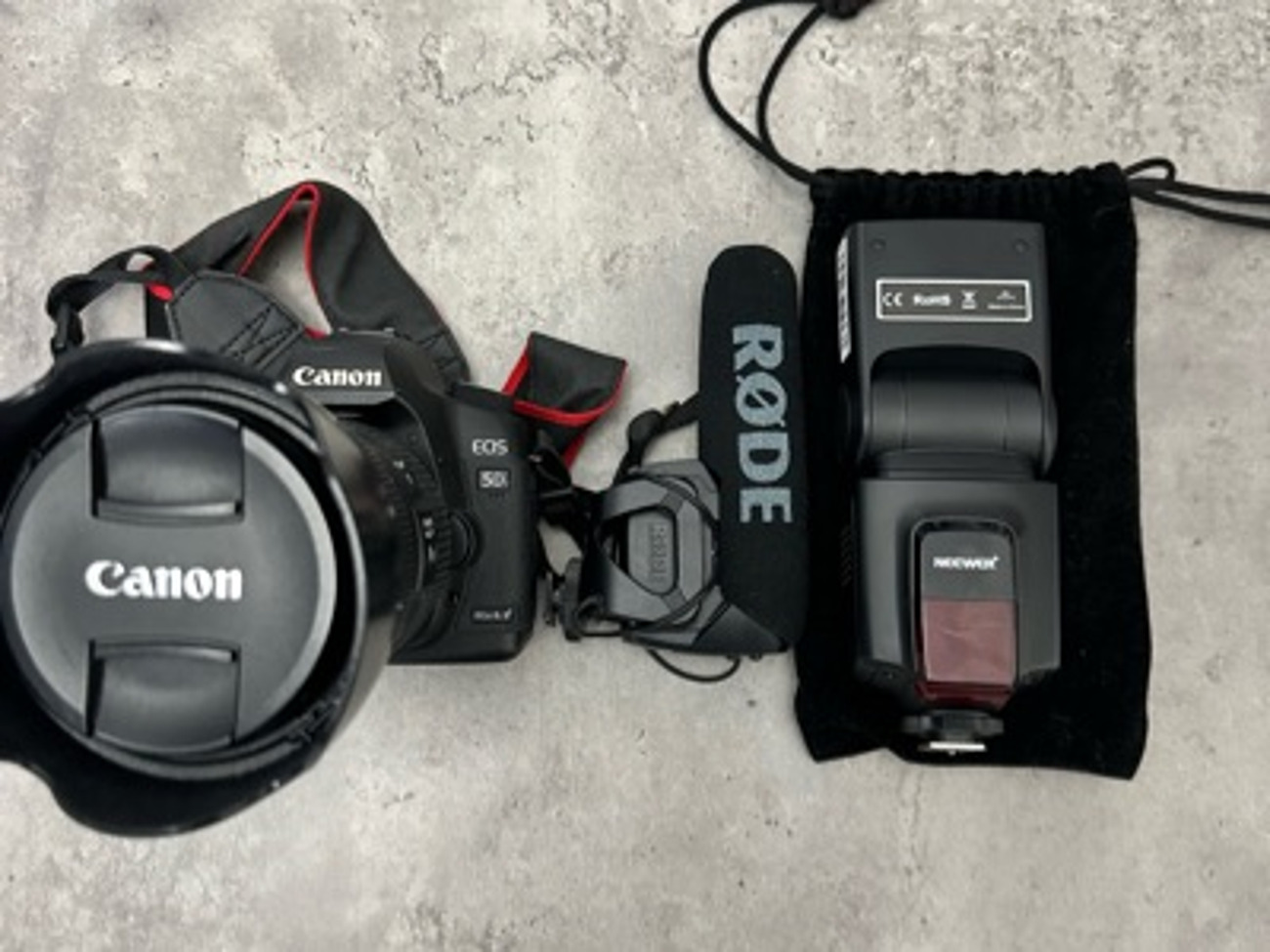 Canon 5d mark ii (with 24-105mm lens, rode mic & flash)