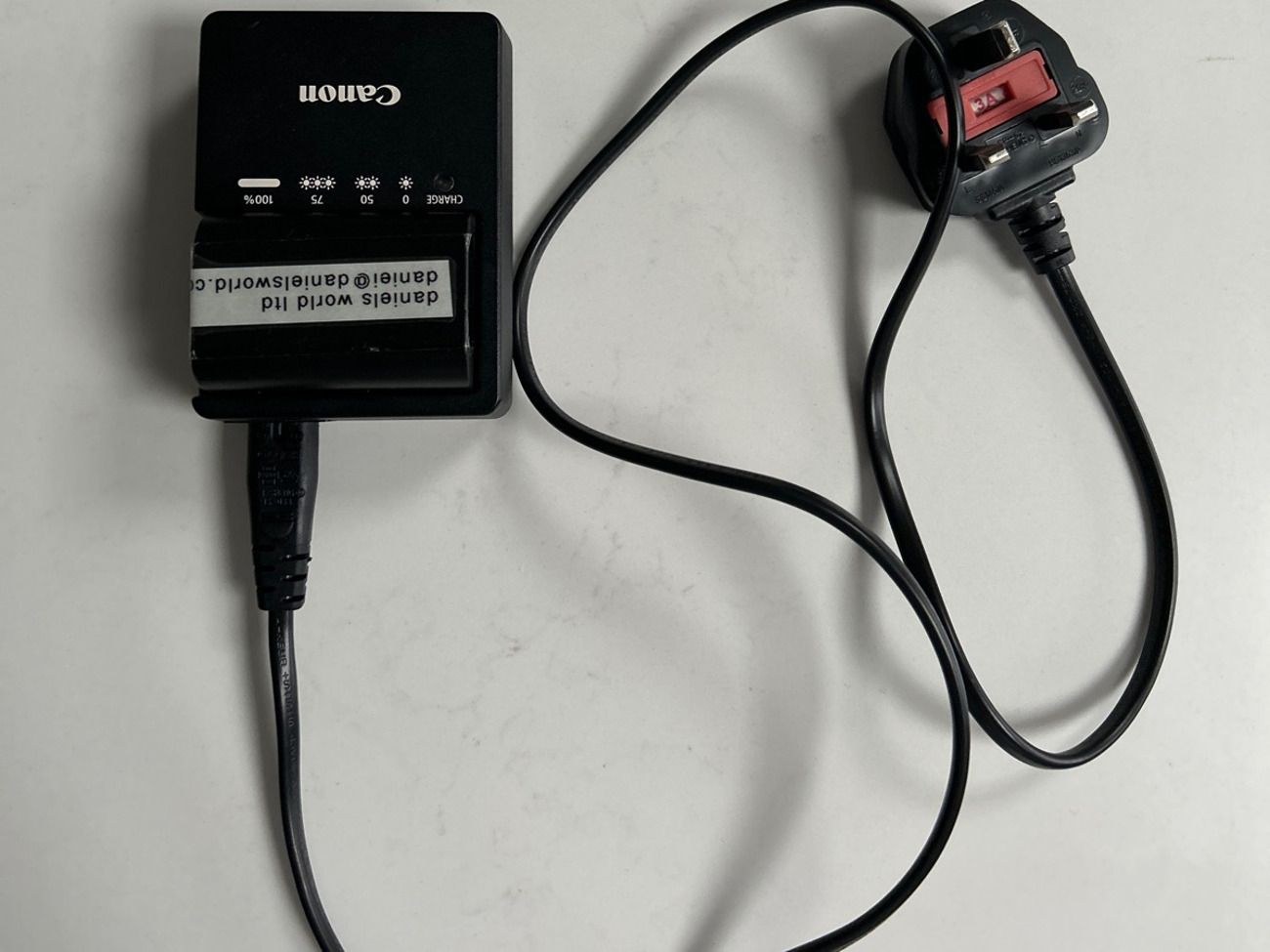 Canon battery charger & batteries x 2 