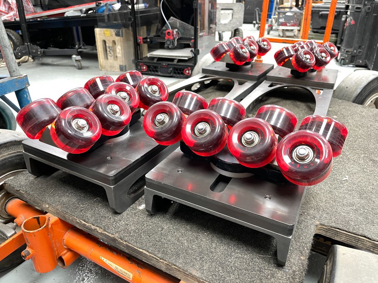 Centipede wheels converts pneumatic wheeled dollies on track (like matthews)