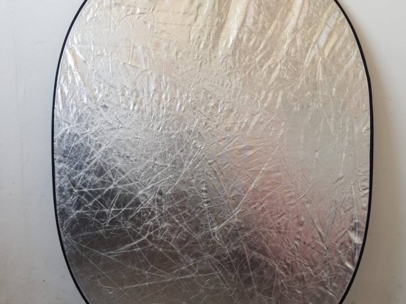 Collapsible multi-disc light reflector with bag
