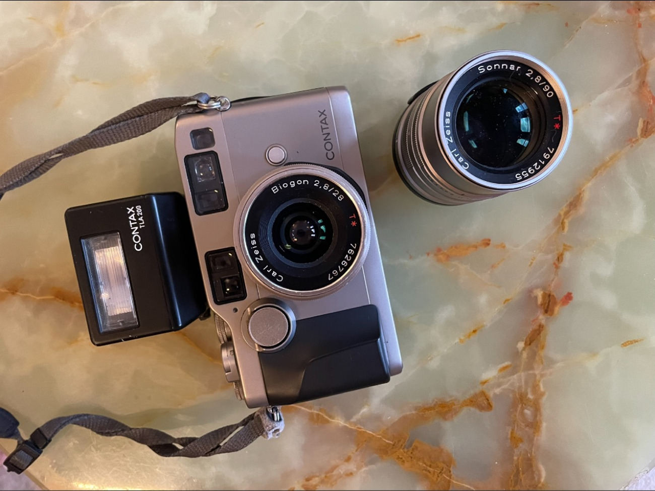 Contax g2, flash, 90mm and 28mm lenses with spare batteries