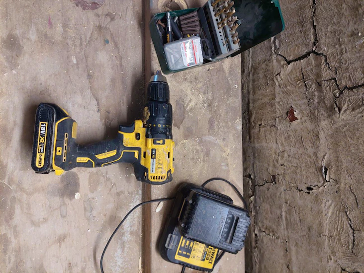 Dewalt brushless power drill with charger and drill bits