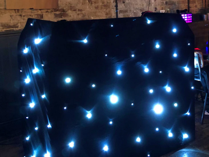 Dj booth with star cloth