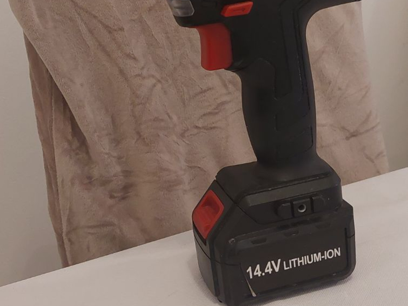 Drill with a charger