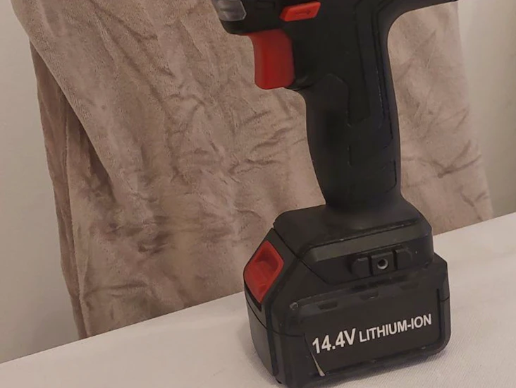 Drill with a charger