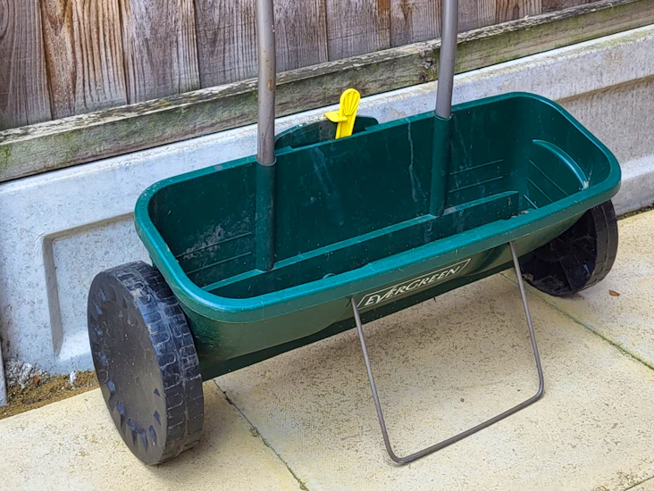 Evergreen seed spreader