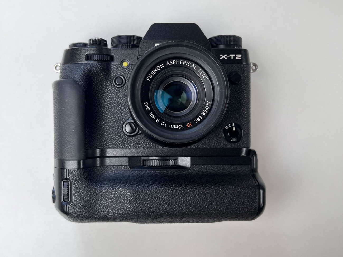Fujifilm x-t2 camera body with battery grip and 35mm f2 lens