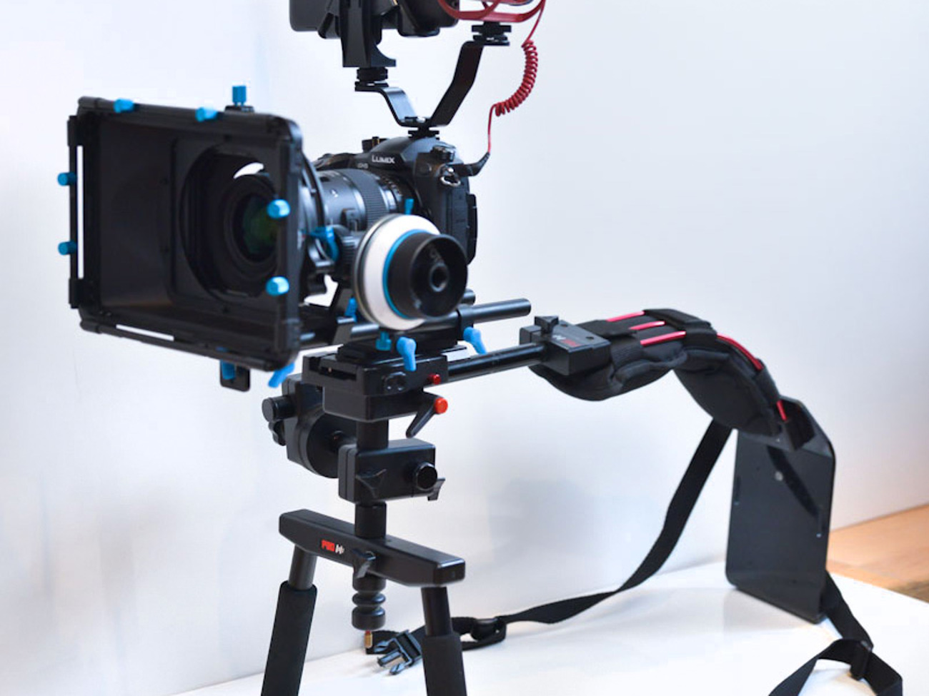 Shoulder rig + follow focus + mic + monitor