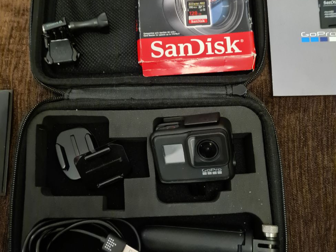 Go pro hero 8 with tripod and 128gb extreme pro card.