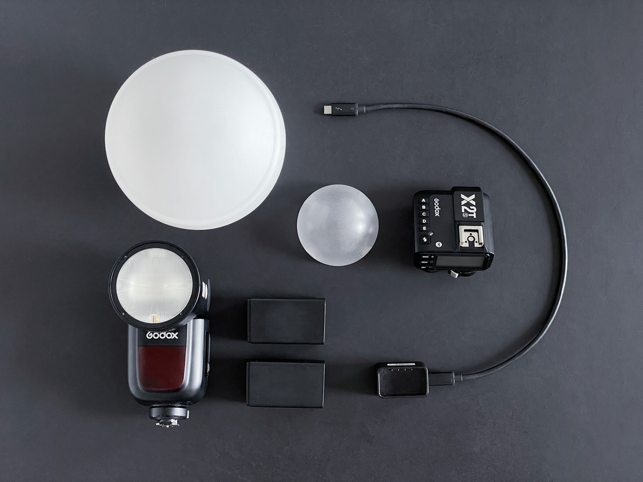 Godox v1 flashgun for sony + 2x battery + transmitter + diffuser