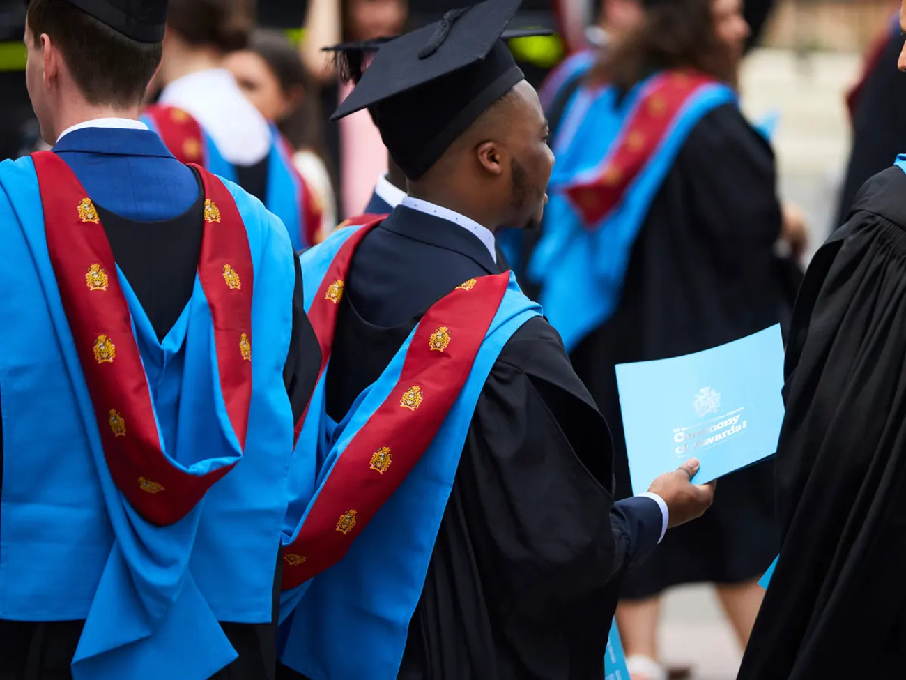 Graduation attire manchester metropolitan university gown