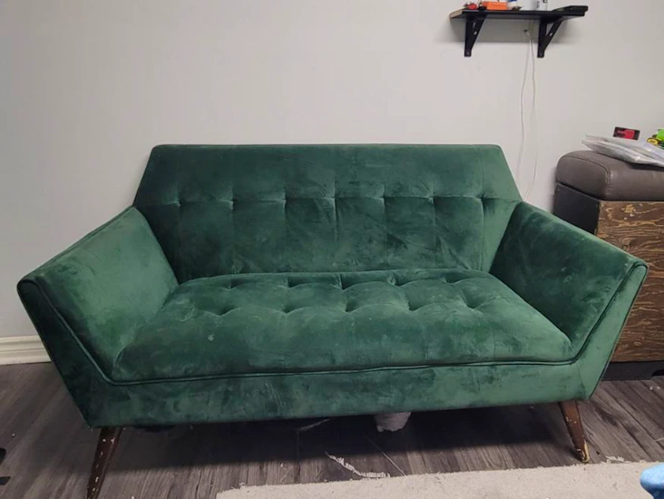 Green velvet love seat
