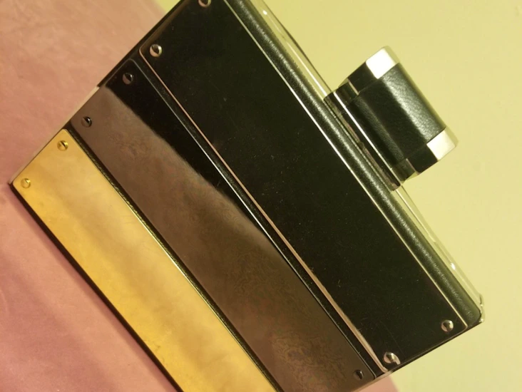 Halston trimirror metal fashion clutch