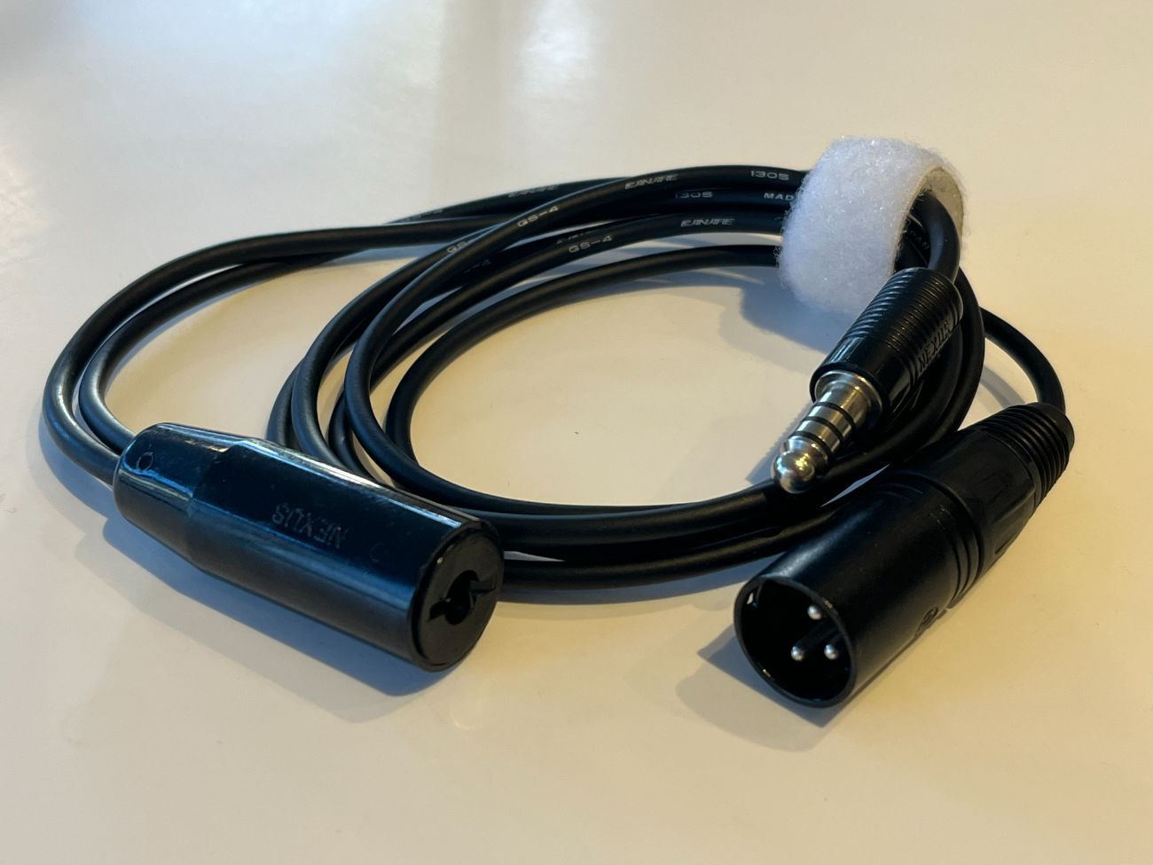 Helicopter intercom adapter