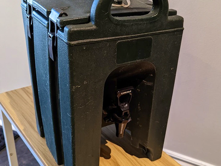 Insulated beverage dispenser thermos container