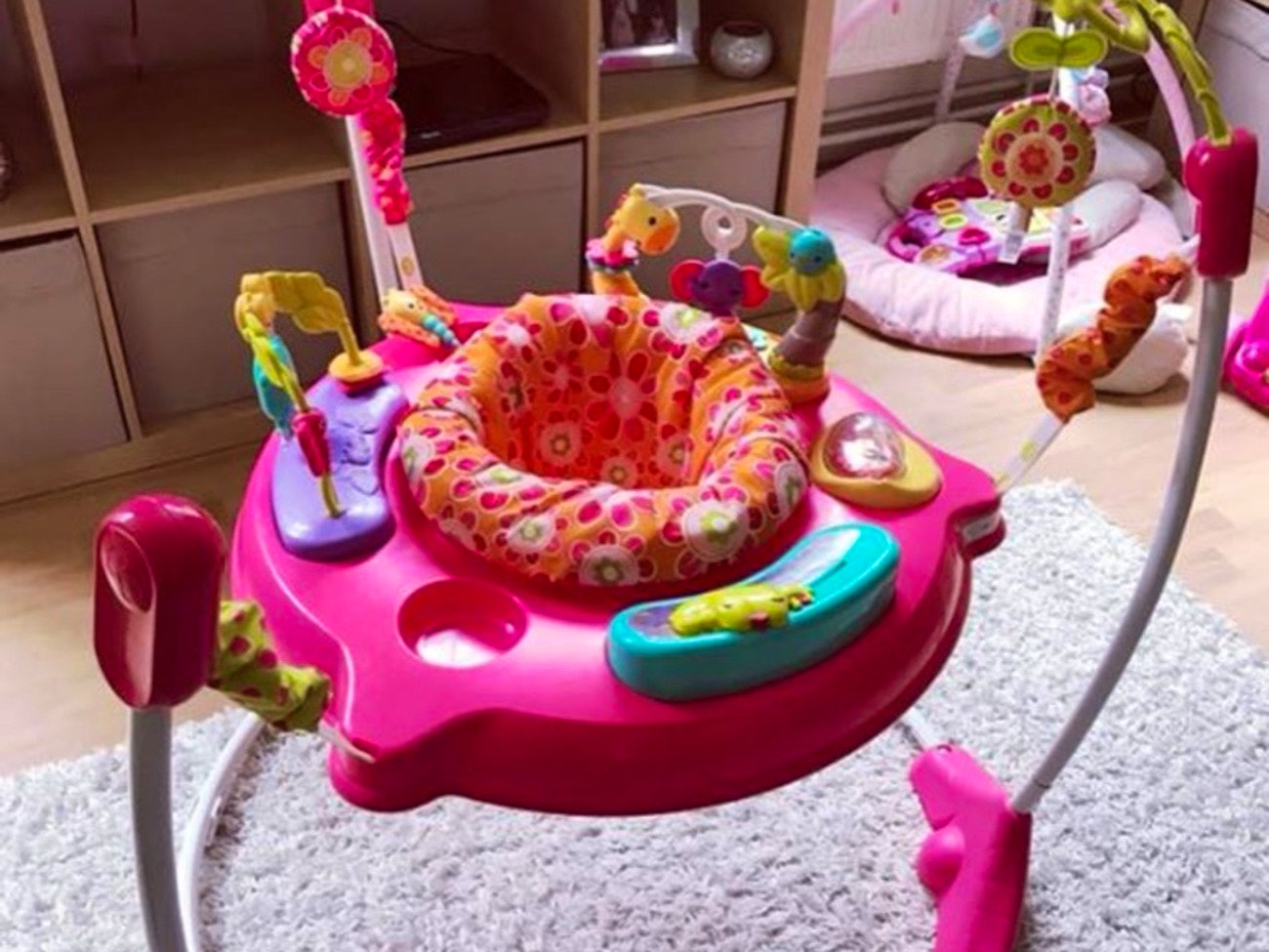 Pink baby jumperoo sales