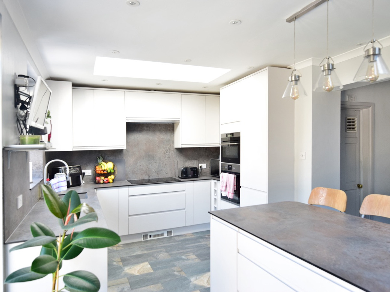 Stunning, modern, minimal daylit kitchen for video photography shoot or meal prep