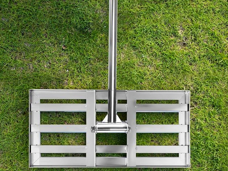 Lawn leveling rake