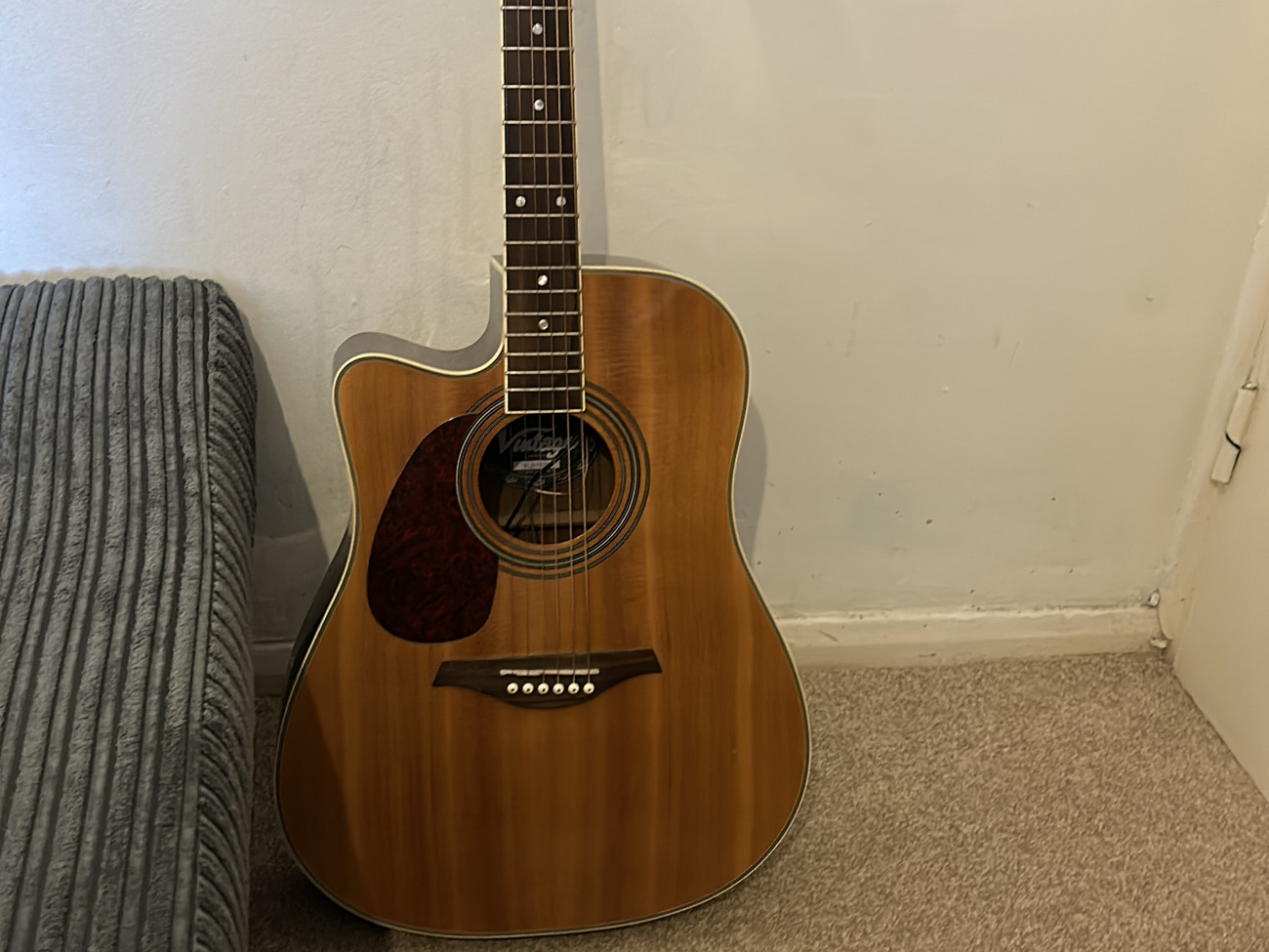Left-handed acoustic electric guitar