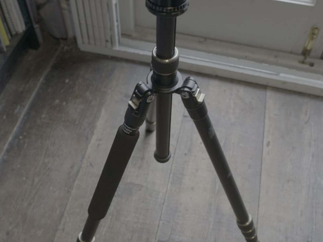 Lightweight tripod with inverse and monopod function and fluid head