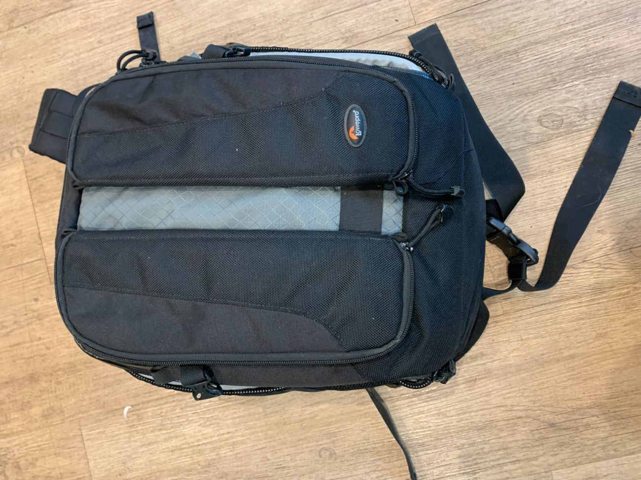 Rent Lowepro Vertex 100 AW Photo 14 Notebook Backpack for Digital SLR 3 4 lenses from Emile W Cricket Green Merton for 2 5 day