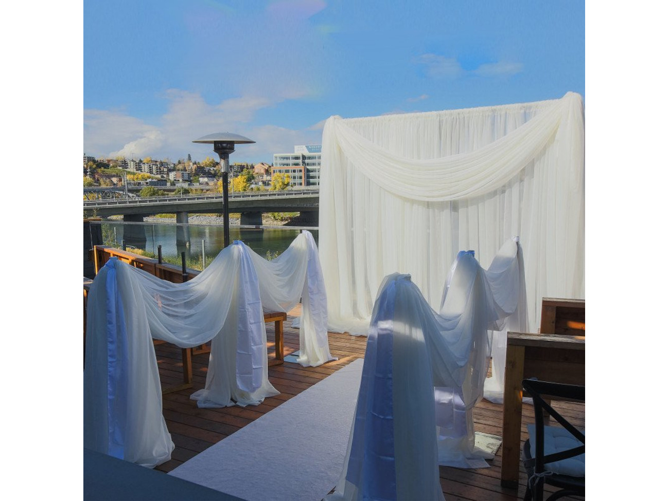 Metal arch with white backdrop - or any color  with chandelier