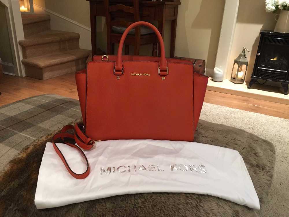 Rent Michael Kors Selma Medium Saffiano Leather Satchel Orange from Emma Pentland Hills City of Edinburgh for 20 day