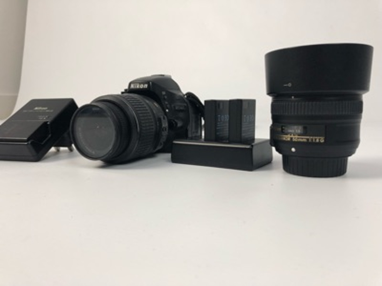 Nikon d5100 x 18-55mm x 50mm lens x 3 batteries