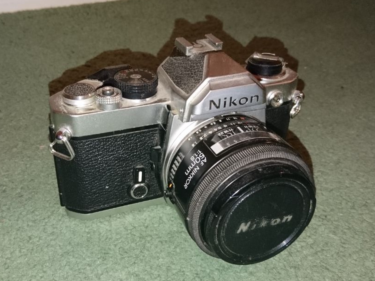 Vintage nikon fm slr film camera (1980) + 50mm f1. 8 lens (1986) - 24/7 pick up