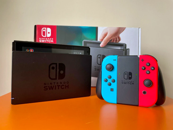 Nintendo switch with 2 pro controllers and 15 games