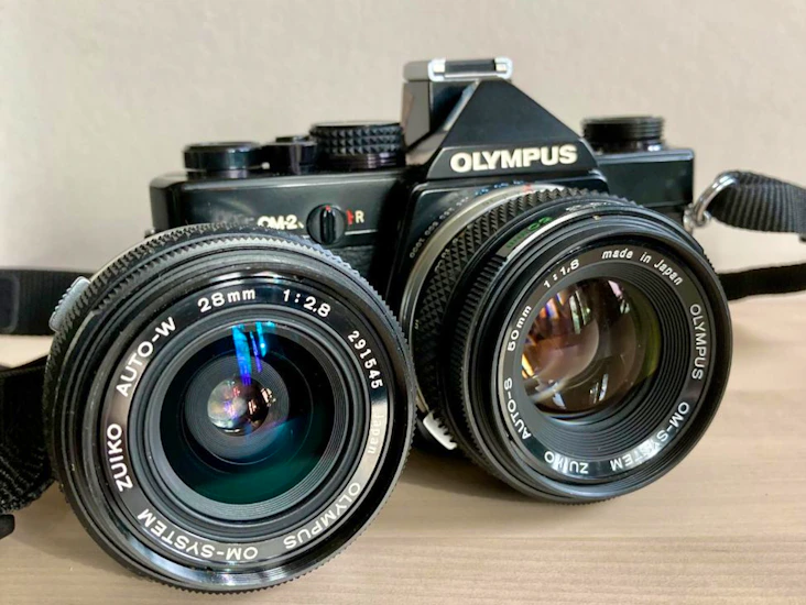 Olympus om2n 35mm film camera + 50mm f1.8 + 28mm f2.8 lenses