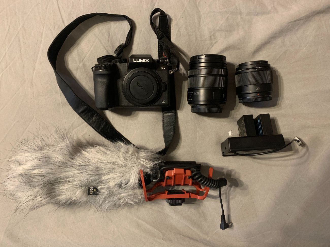 Panasonic lumix g7, 14-140mm, 25mm prime, rode videomic pro