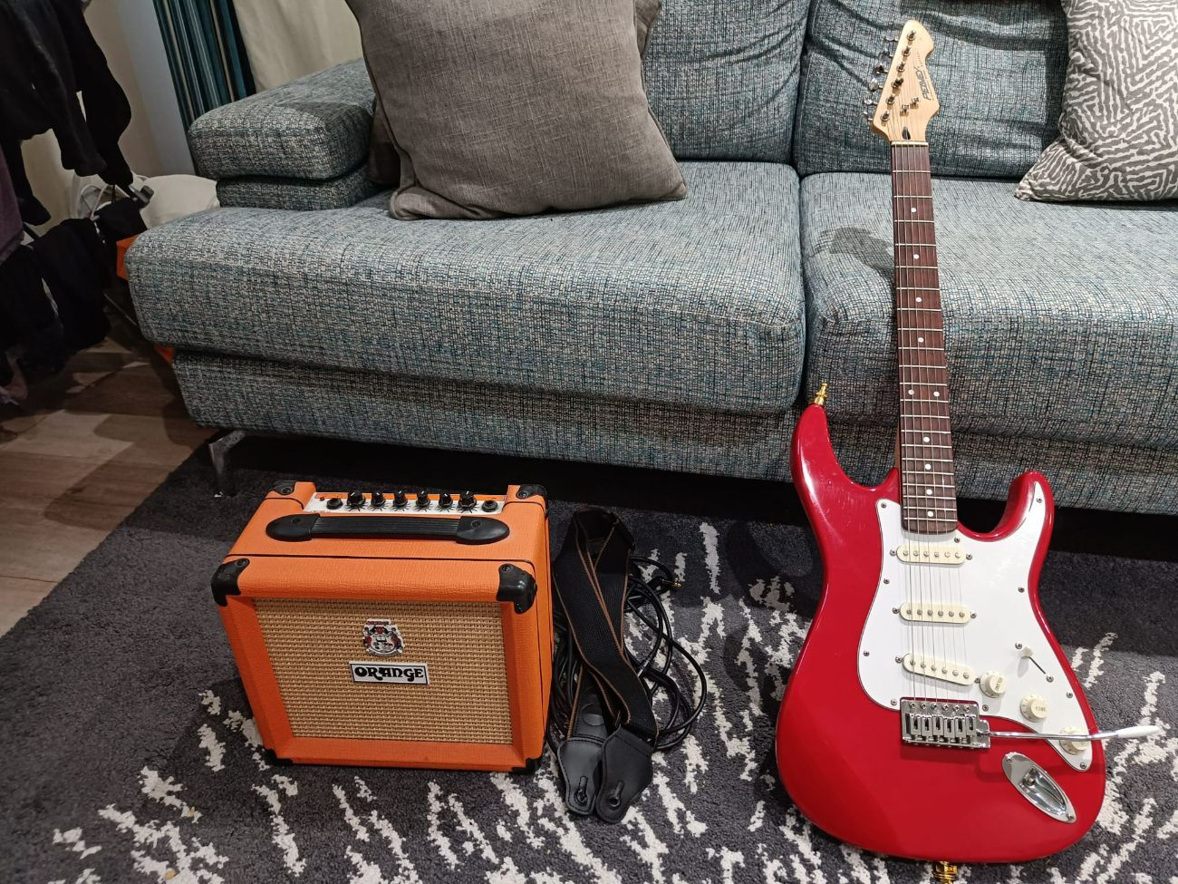 Peavey raptor electric guitar and orange crush 12 combo