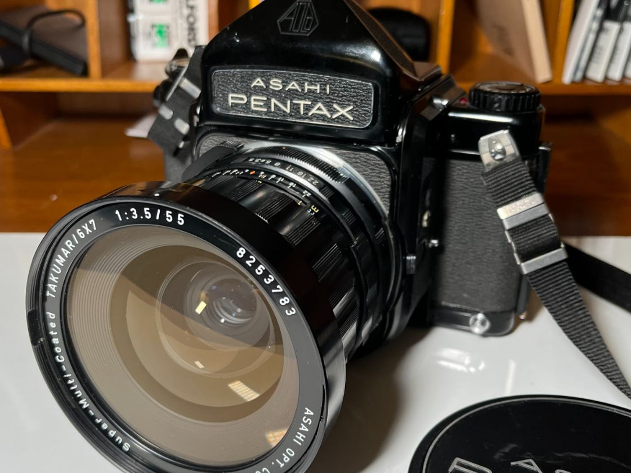 Pentax 6x7 with 55mm f3.5 lens, hood and caps