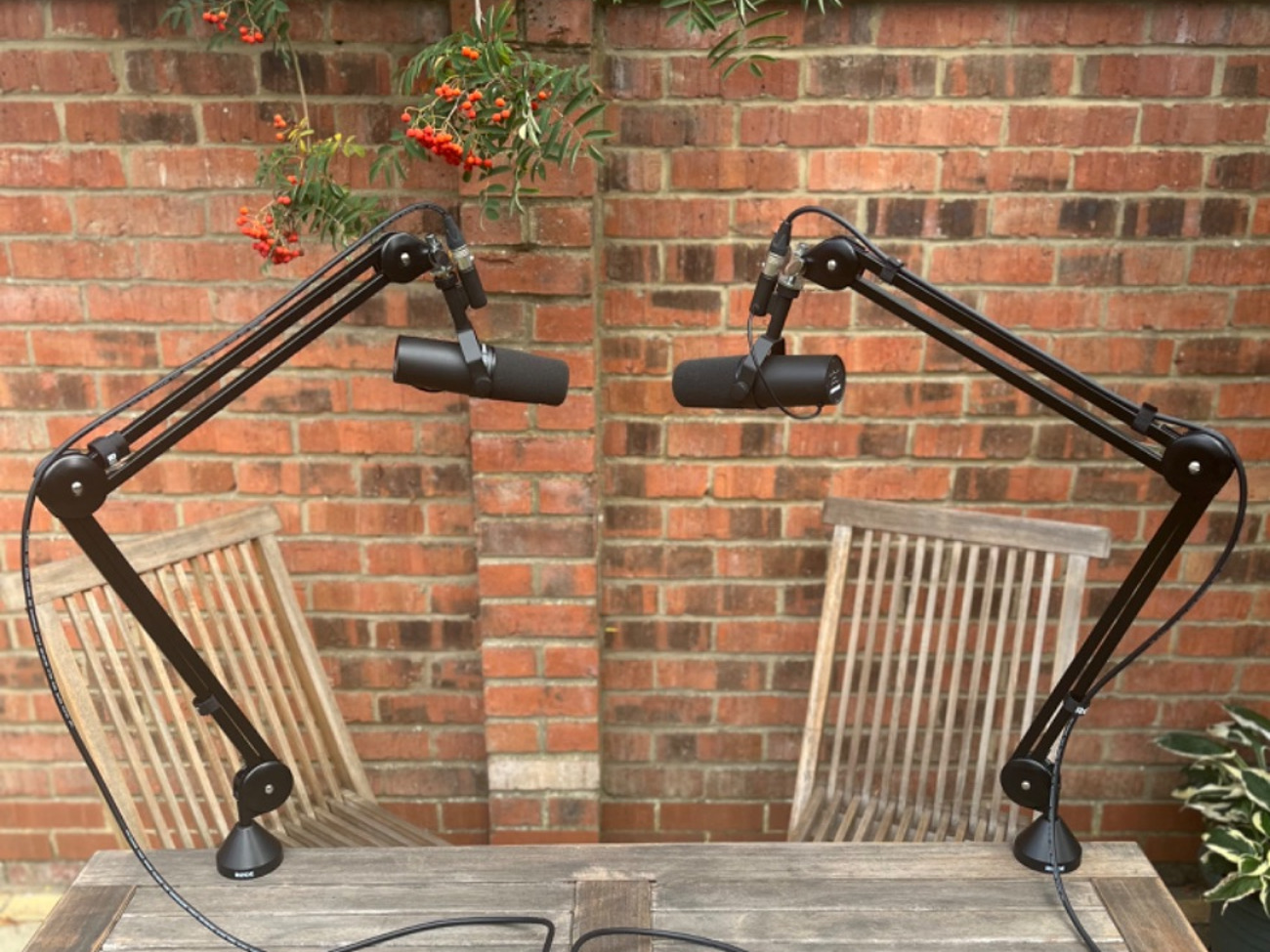 Podcast studio setup: 2 x shure sm7bs, 2 x rode psa1 arms…