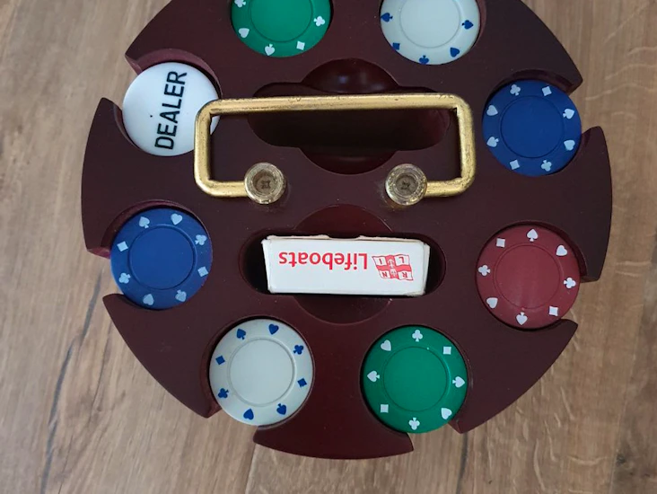 Poker set with rotating chip holder and full deck of cards