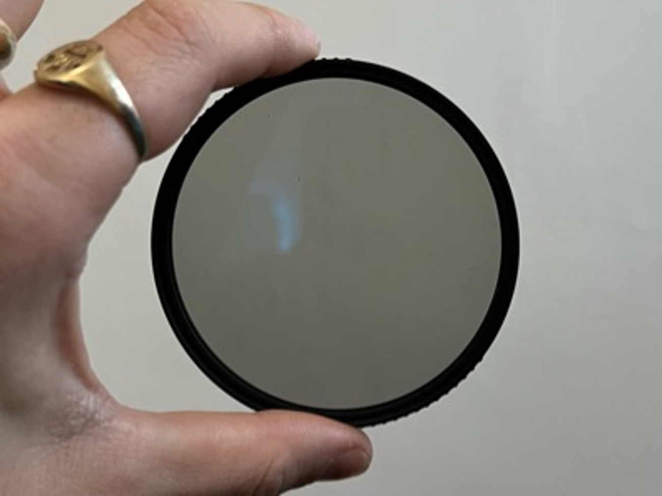 Polarising lens filter