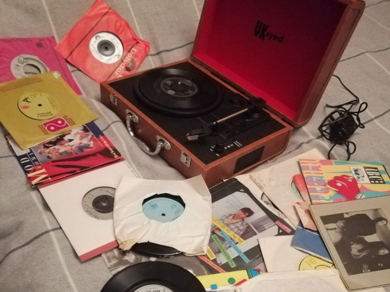 Portable record player with records