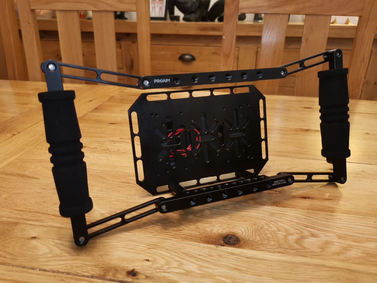 Proaim directors monitor cage