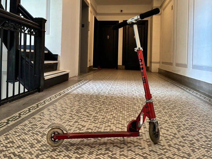 Red micro scooter/ kickboard